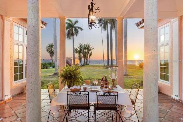 4511 Bay Shore Rd, Sarasota, FL 34234 - view of patio / terrace featuring a water view and outdoor dining space