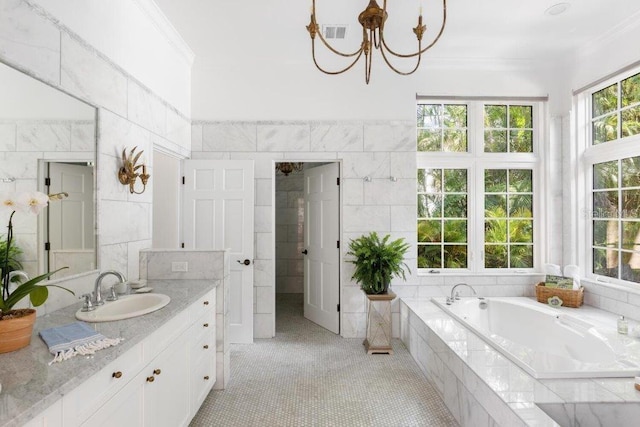 4511 Bay Shore Rd, Sarasota, FL 34234 - full bathroom with tile walls, vanity, crown molding, a bath, and a chandelier