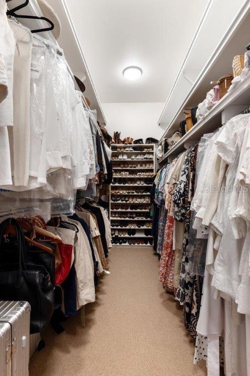 4511 Bay Shore Rd, Sarasota, FL 34234 - spacious closet featuring carpet flooring