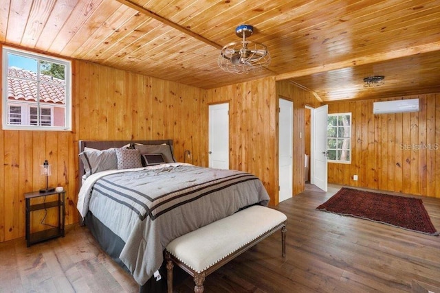 4511 Bay Shore Rd, Sarasota, FL 34234 - bedroom with wooden ceiling, a wall unit AC, wood-type flooring, wood walls, and a chandelier