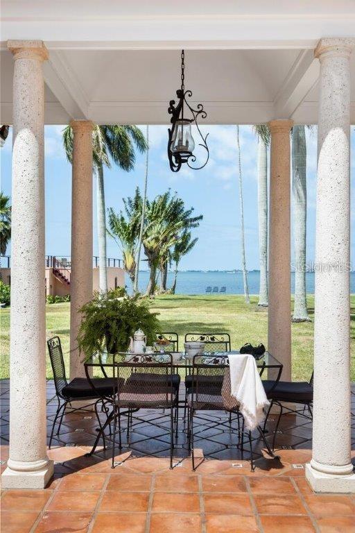 view of patio featuring a water view