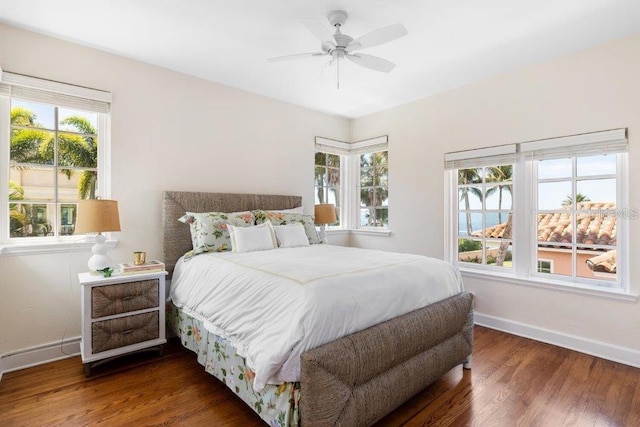 bedroom featuring dark hardwood / wood-style floors and ceiling fan