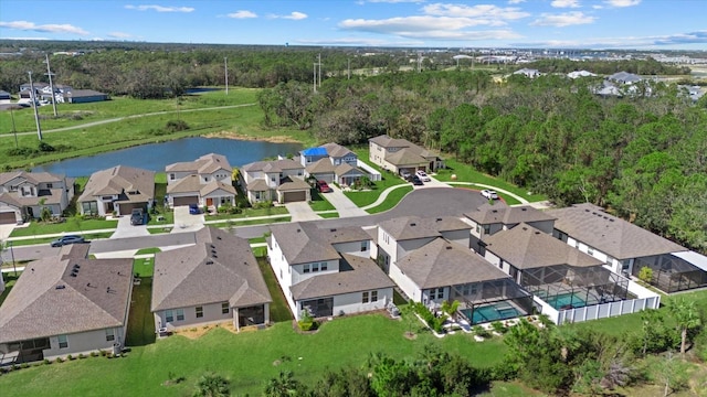 drone / aerial view with a water view