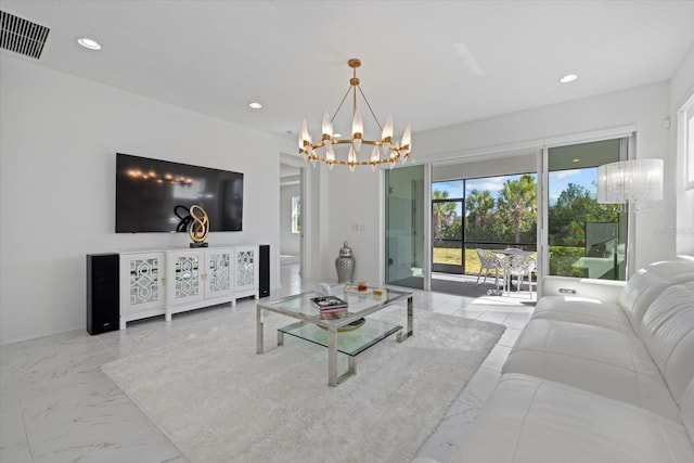 living room with a notable chandelier