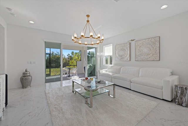 living room featuring a notable chandelier