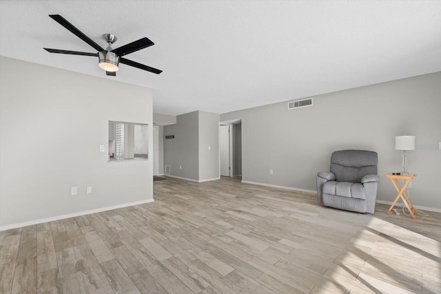 unfurnished room with light hardwood / wood-style floors and ceiling fan