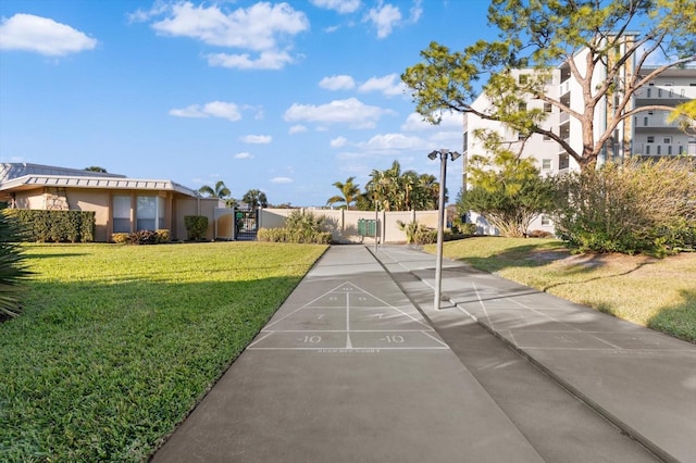 view of home's community featuring a yard