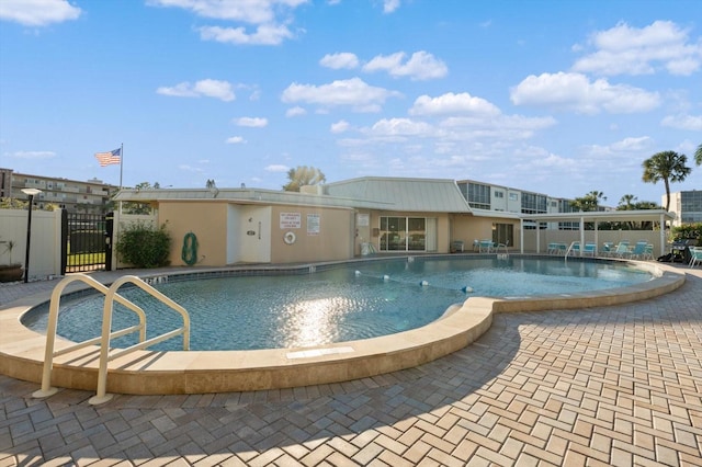 view of pool featuring a patio