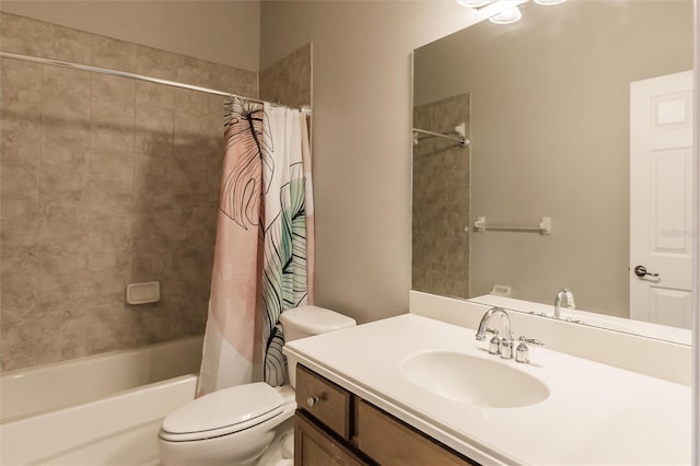 full bathroom with vanity, shower / bath combination with curtain, and toilet