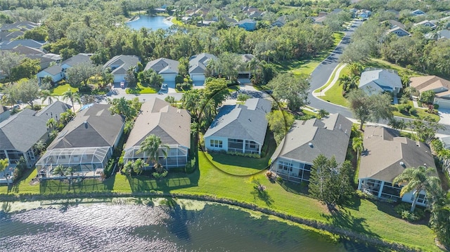 drone / aerial view with a water view