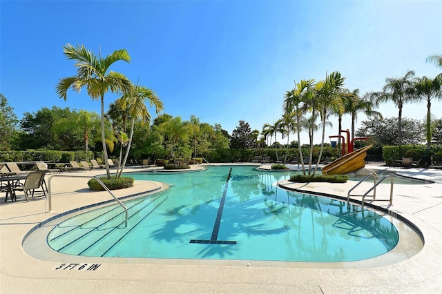 7407 Sea Island Ln, Bradenton, FL 34201 - community pool with a patio area