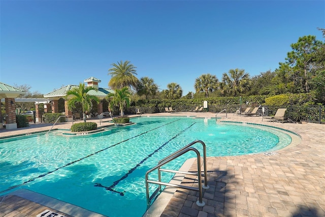 7407 Sea Island Ln, Bradenton, FL 34201 - community pool featuring a patio
