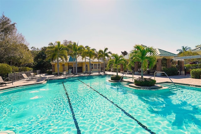 7407 Sea Island Ln, Bradenton, FL 34201 - community pool featuring a patio area