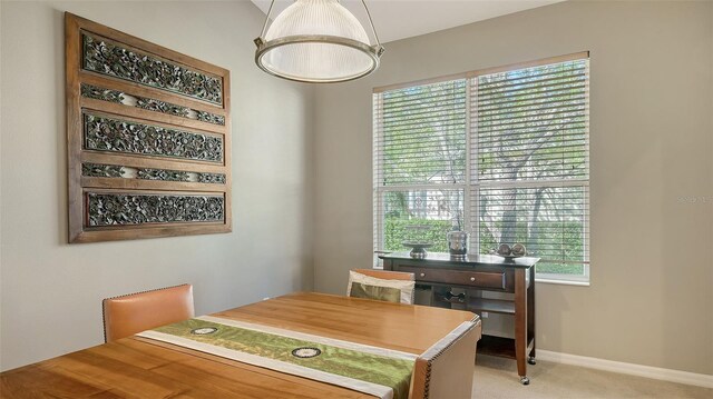 7407 Sea Island Ln, Bradenton, FL 34201 - dining space with light carpet and baseboards