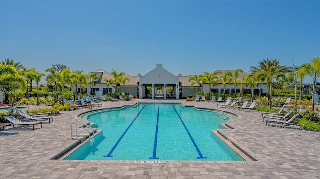 view of swimming pool featuring a patio area