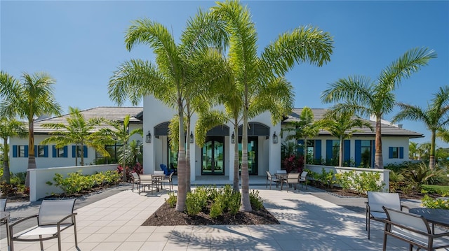 back of property with a patio area