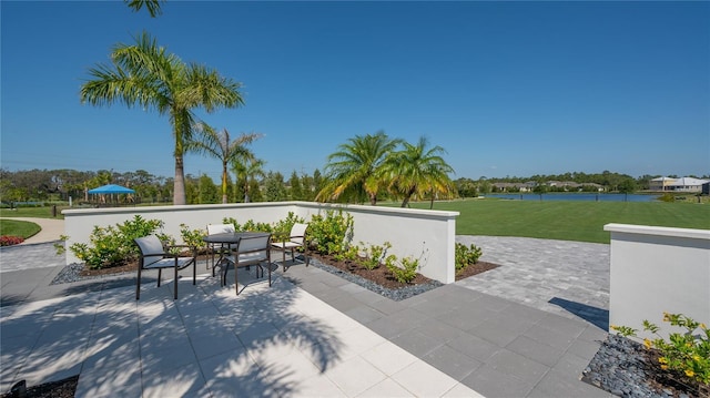 view of patio / terrace featuring a water view