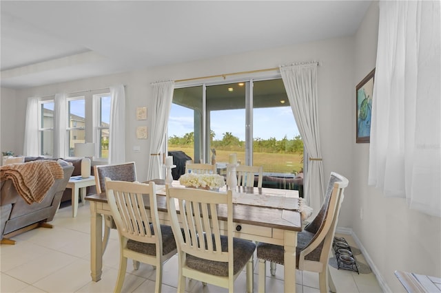 dining room featuring light tile patterned floors