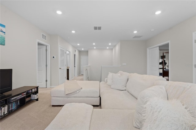 living room featuring light carpet