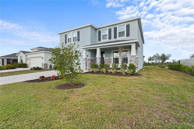 view of front of home featuring stone siding, a front yard, driveway, and stucco siding