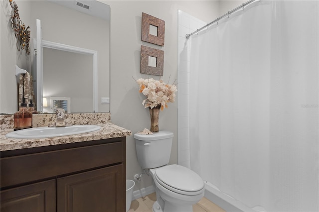 full bath with toilet, vanity, and visible vents