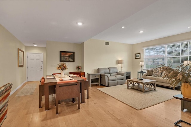 living room with light hardwood / wood-style floors