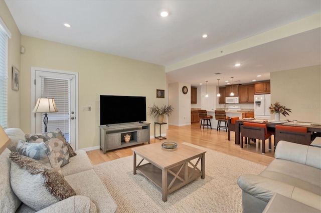 living room featuring light wood-type flooring