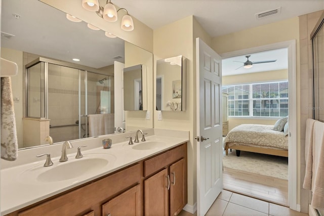 bathroom featuring walk in shower, wood-type flooring, vanity, and ceiling fan