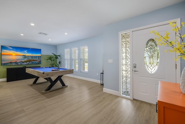 entrance foyer featuring light hardwood / wood-style flooring and pool table