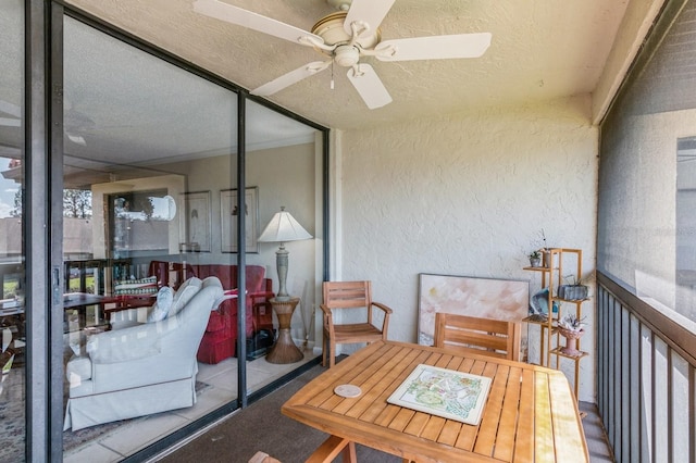 balcony featuring ceiling fan