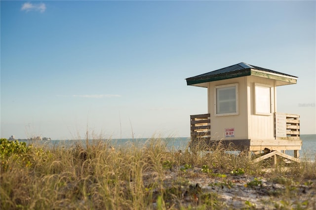 exterior space featuring a water view