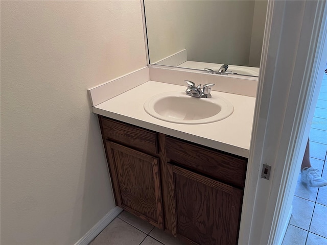 bathroom featuring vanity and tile patterned flooring