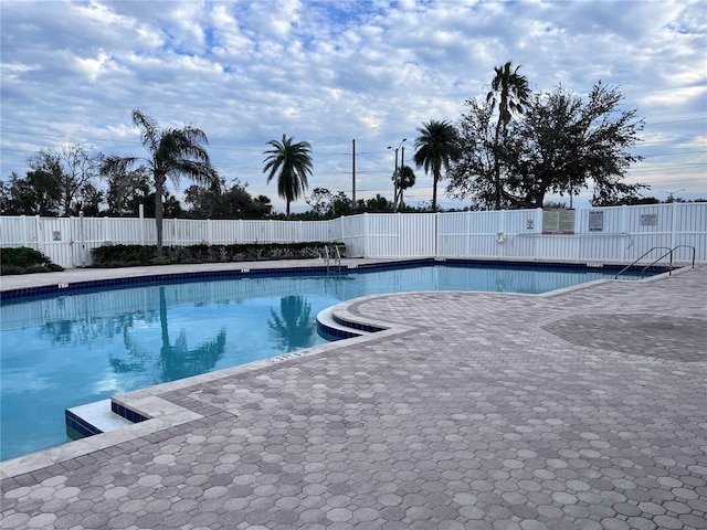 view of pool featuring a patio area