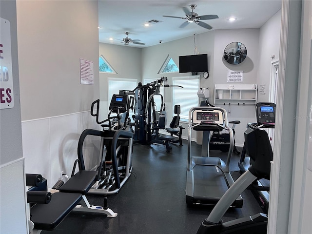 gym with a wealth of natural light and ceiling fan