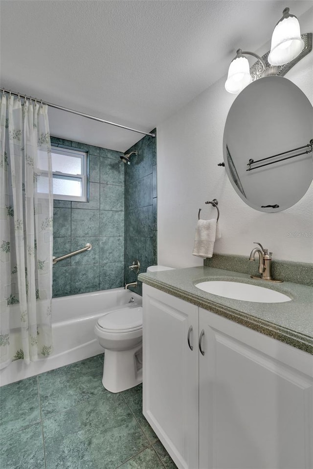 full bathroom featuring vanity, tile patterned flooring, toilet, shower / bath combo with shower curtain, and a textured ceiling