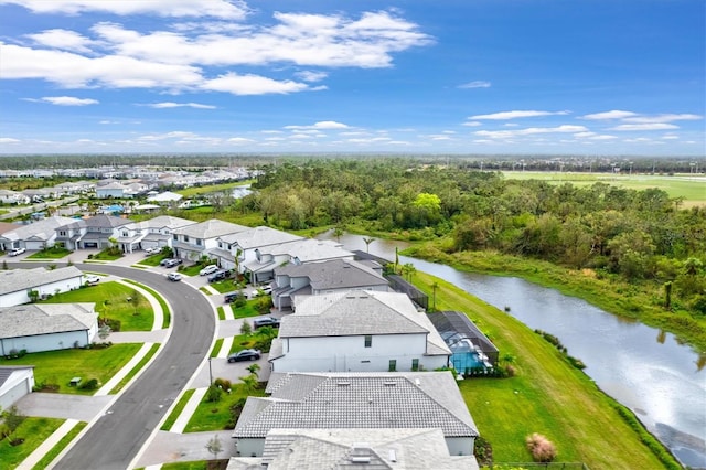 drone / aerial view with a water view