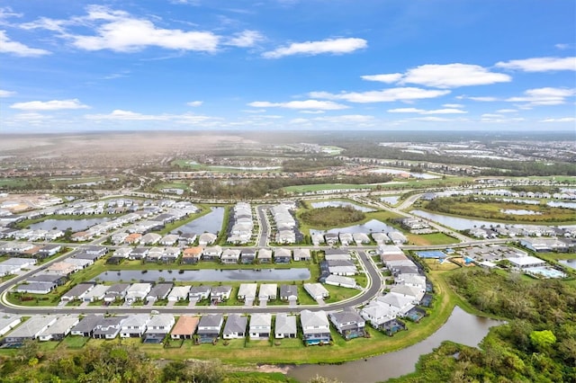 bird's eye view with a water view