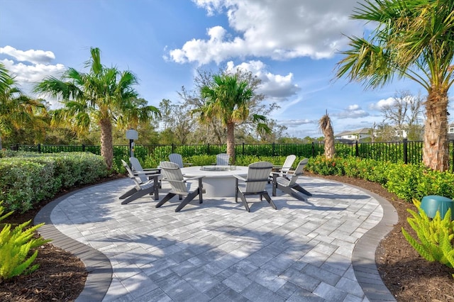 view of patio / terrace featuring a fire pit