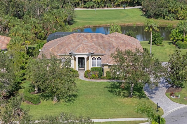 birds eye view of property with a water view