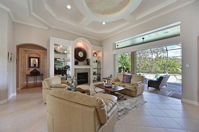 living room featuring light tile patterned floors, crown molding, a high ceiling, and coffered ceiling