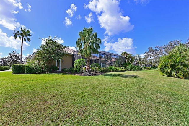 view of yard featuring a lanai