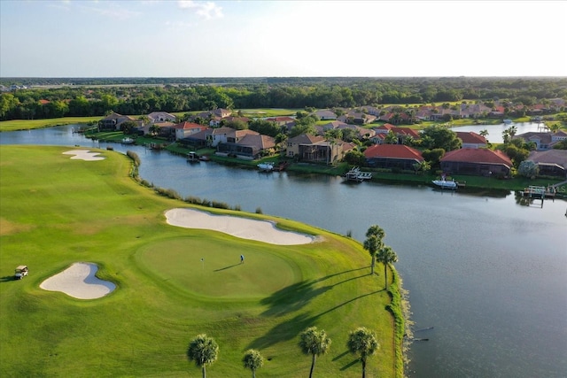 10209 Discovery Ter, Bradenton, FL 34212 - aerial view of residential area featuring a large body of water, a golf club, and a tree filled landscape