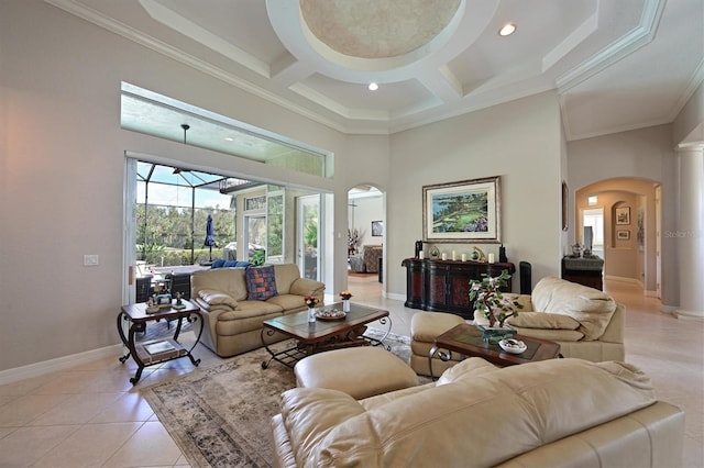 living room featuring light tile patterned floors, arched walkways, a towering ceiling, and crown molding