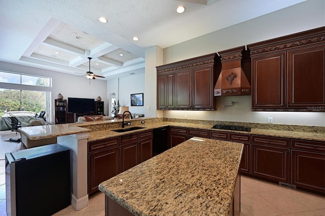 kitchen featuring open floor plan, a peninsula, coffered ceiling, a ceiling fan, and a sink