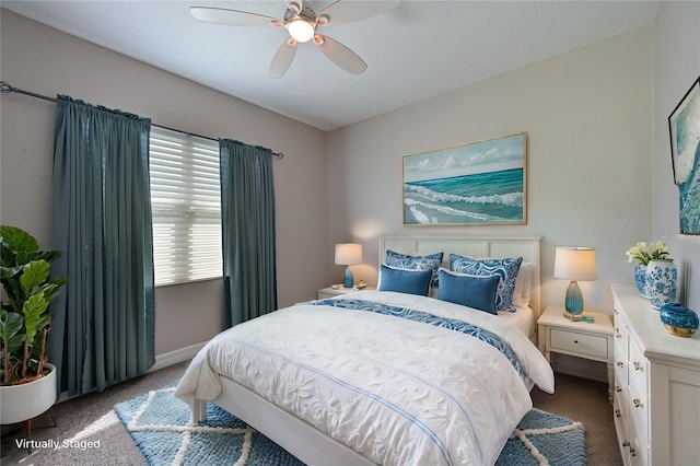 bedroom featuring baseboards, carpet, and ceiling fan