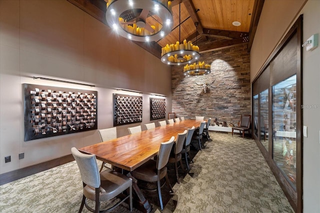 dining space featuring high vaulted ceiling and wooden ceiling