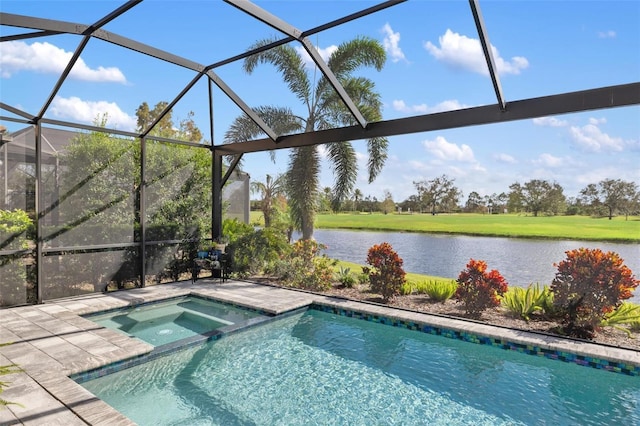 view of swimming pool with an in ground hot tub, a water view, and glass enclosure