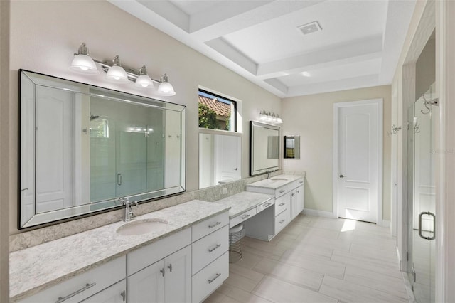 bathroom featuring vanity and a shower with door