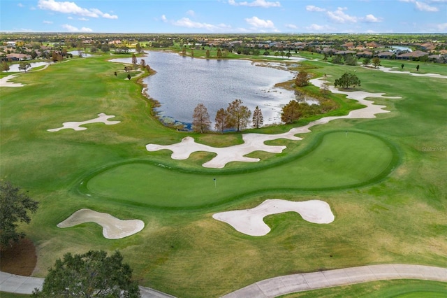 surrounding community featuring a water view