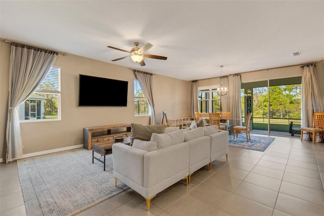 living room featuring a healthy amount of sunlight and light tile patterned flooring